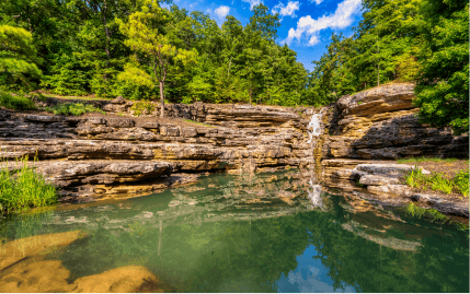A beautiful waterfall at Lost Canyon Cave and Nature Trail just outside of Branson, Missouri.