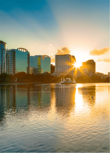 A stunning sunset over Lake Eola and the downtown Orlando skyline.