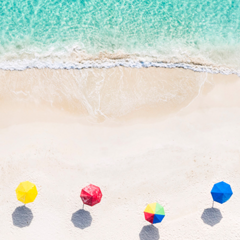 View from above of a beach with umbrellas