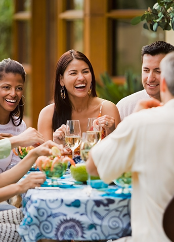 Group of people eating in a table